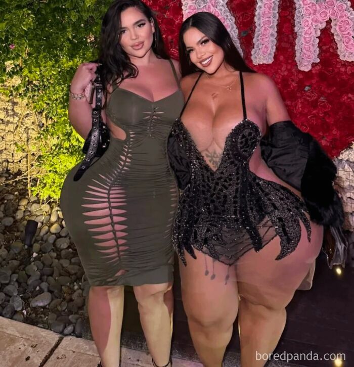 Two women posing at night wearing form-fitting outfits with exaggerated Instagram edits showing unusual body proportions.