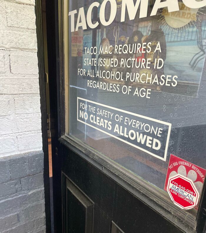 Store door with a No Cleats Allowed sign, highlighting specific rules. This image relates to underwear must be worn.