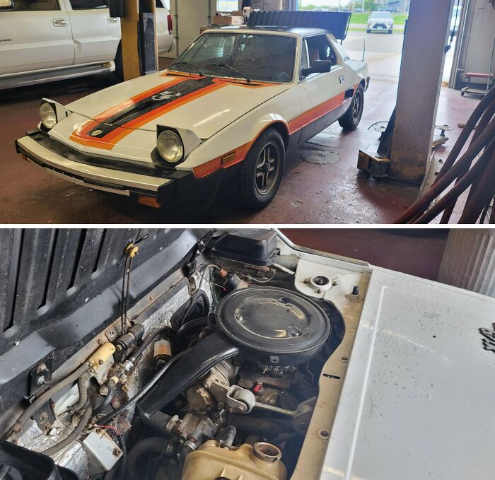 Classic car with vintage orange racing stripes and a close-up of its engine inside a mechanic's garage.