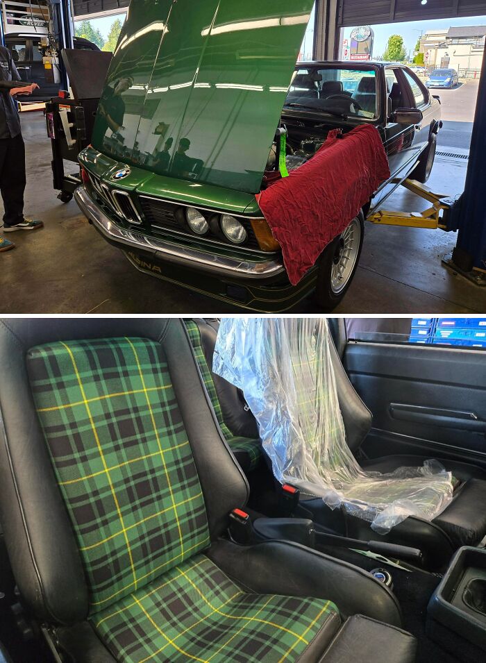 Green vintage BMW car on a lift in a garage and close-up of its unique plaid car mechanics seats interior.