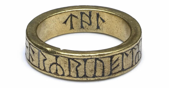 Ancient ring with mysterious engraved symbols representing urban myths and events with unknown real truth.