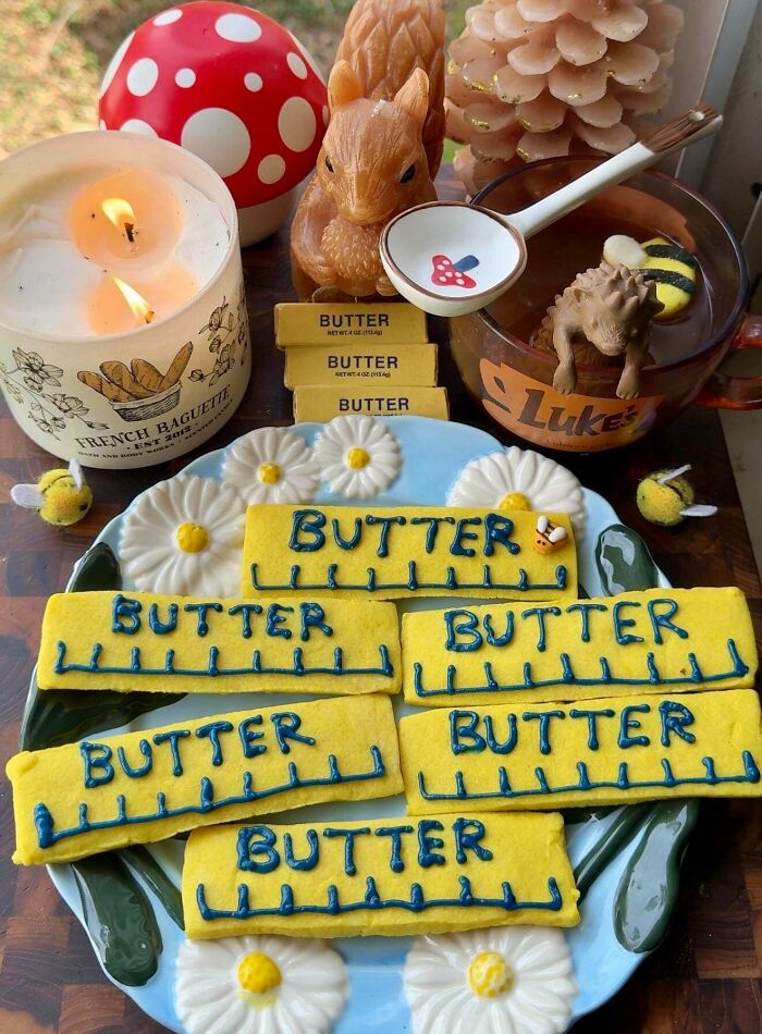Butter stick themed cookies with yellow icing and blue butter labels