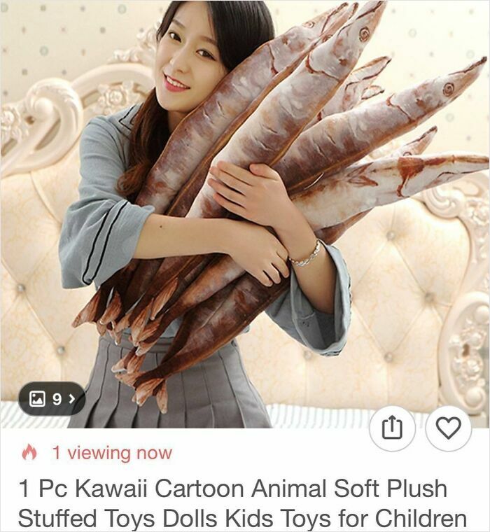 Woman holding multiple large soft plush toys shaped like fish, a surprising find while shopping on Wish.