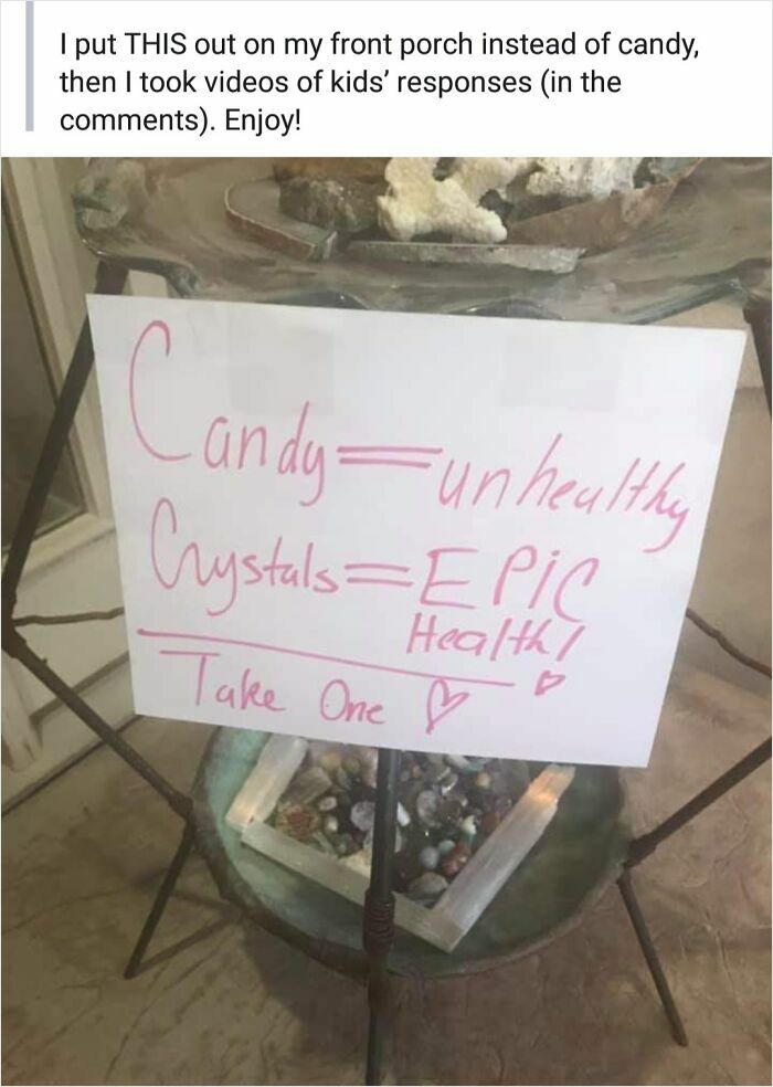 Sign on table comparing candy as unhealthy and crystals as epic health, illustrating toxic mothers infuriating people.