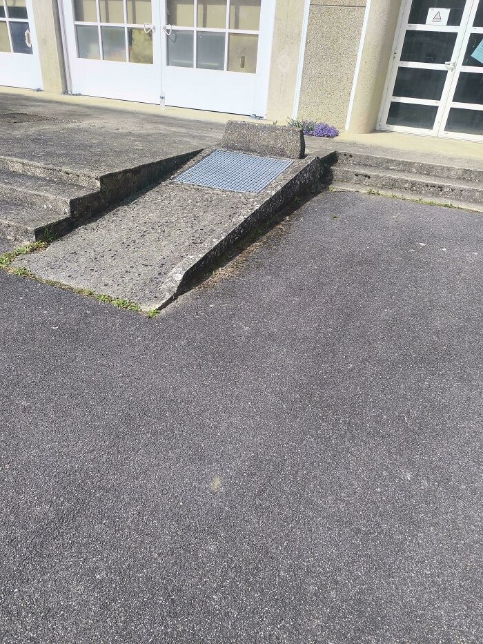 A concrete ramp leading to a wall, another funny you had one job fail.