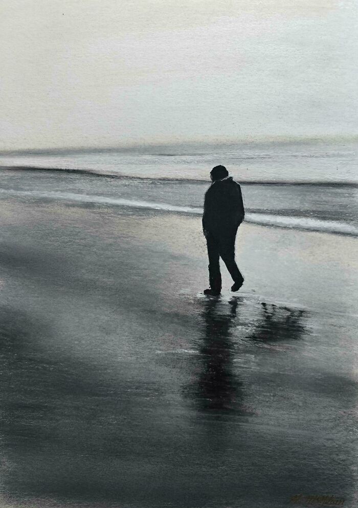 A handmade painting shows a person walking on a beach with a dark, moody sky and reflections on the wet sand.