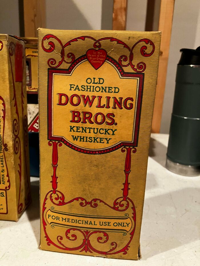 An old, ornate yellow box of Dowling Bros. Kentucky Whiskey with red trim, marked "For Medicinal Use Only." A true unusual possession.