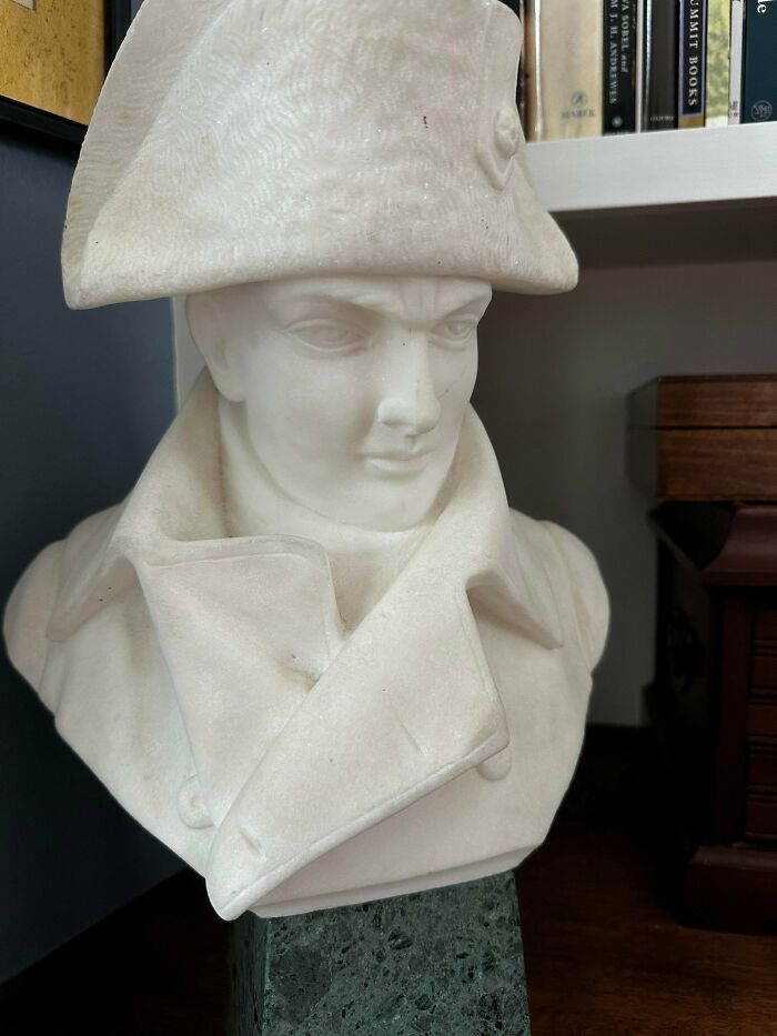 A white marble bust of Napoleon Bonaparte with a stern expression, showcasing the true value of unusual possessions.
