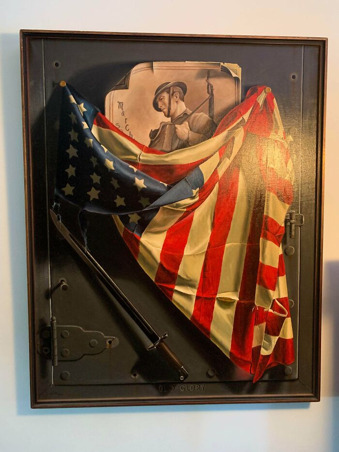 A painting depicting a US flag draped over a soldier and a bayonet, an unusual possession with true value.