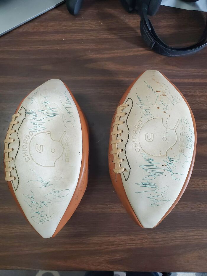 Two Chicago Bears mini footballs, signed by players, illustrating the true value of unusual possessions.