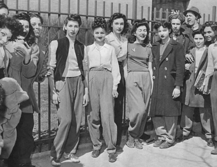 Group of young people from decades ago posing outside, a historic photo that speaks louder than today's headlines.