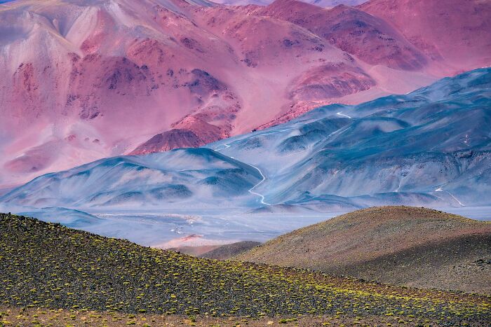 Unbelievable Photos of stunning, alien-like landscapes on Earth. Pink and blue mountains with winding paths, truly another universe.