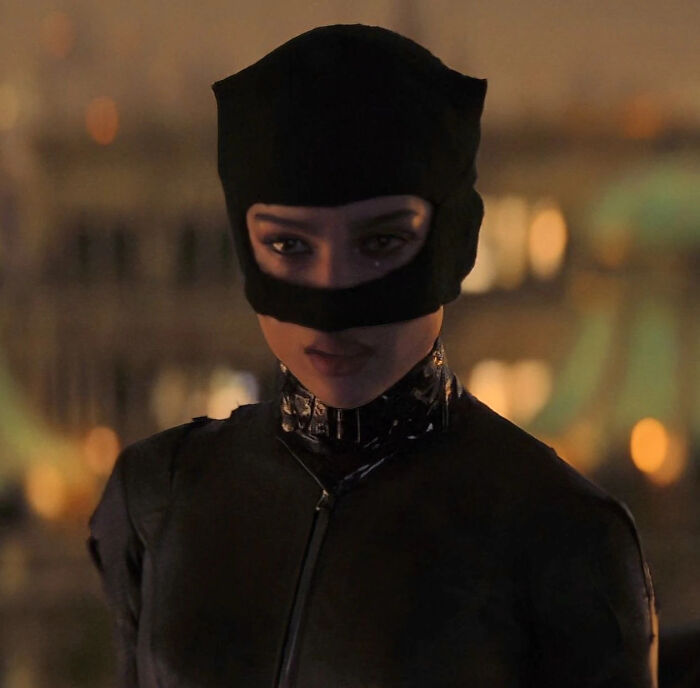 Zoe Kravitz as Catwoman, looking intense in a close-up, part of hilarious nonsensical movie details.