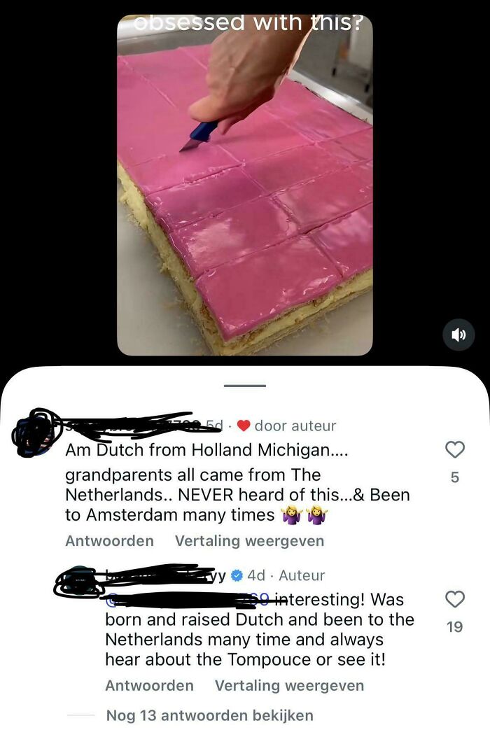 Hand slicing a pink-frosted Dutch tompouce pastry, highlighting Americans confidently posting geographic confusion online.