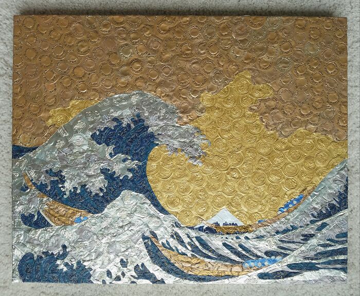 The Great Wave off Kanagawa made from upcycled trash, showcasing creative people turning trash into something artistic.