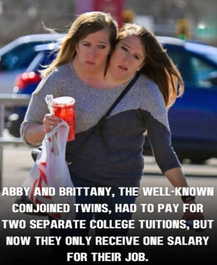 Conjoined twins Abby and Brittany looking serious, highlighting the unfairness of affording billionaires while struggling.