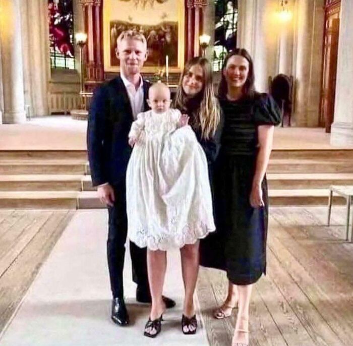 A misleading photo where a baby appears to have long adult legs, creating a confusing real-life glitch effect.