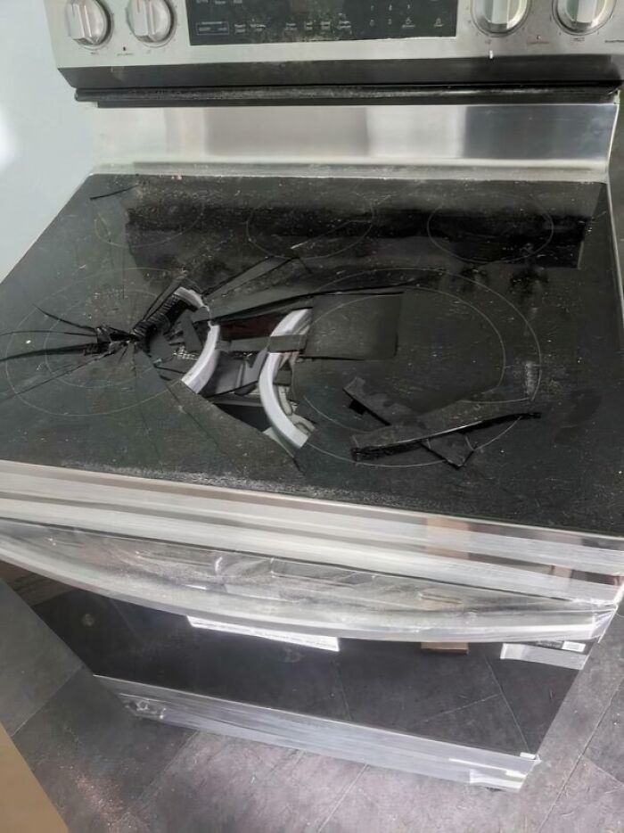 A shattered stovetop, glass pieces scattered, highlighting home improvement fails. The main SEO keyword is "Home Improvement Fails".