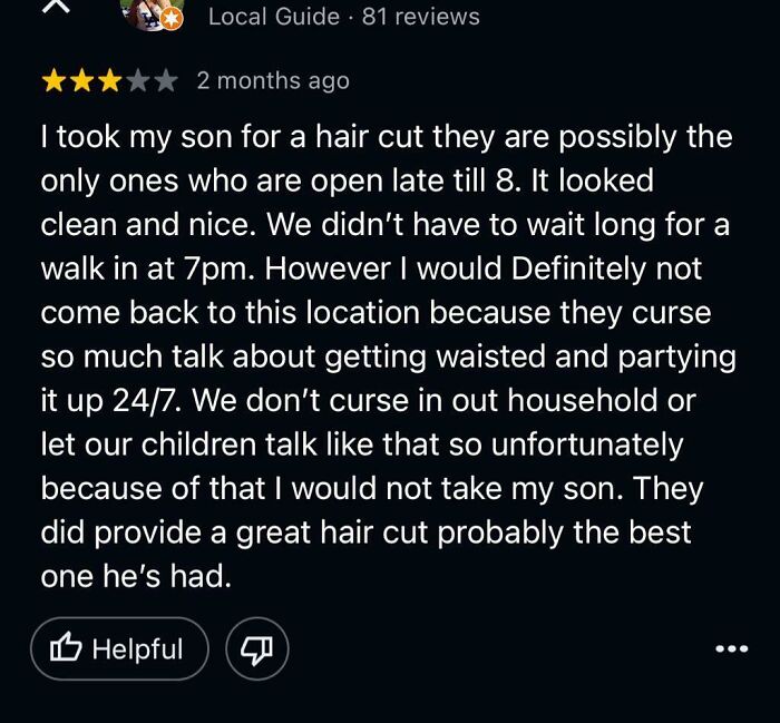 A user review for a haircut place, expressing disappointment over the language, mirroring a hilariously honest review.