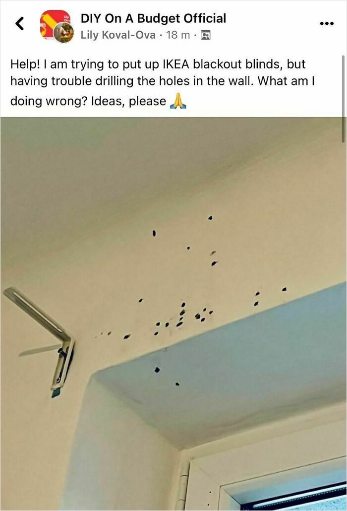 A wall filled with many poorly drilled holes for blackout blinds, a home improvement fail.