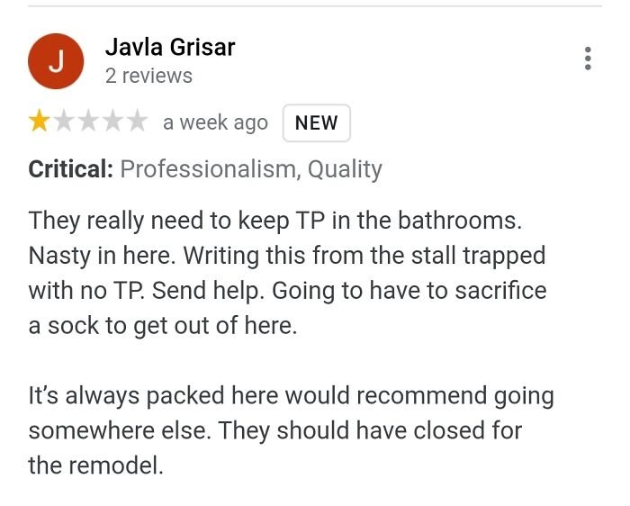 A hilariously honest review by Javla Grisar, describing a "huge disappointment" in a bathroom with no toilet paper.