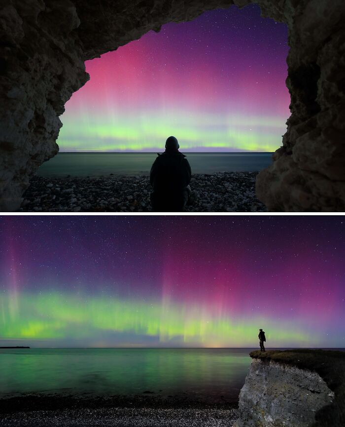 Breathtaking travel photos: a person watches the aurora borealis from a cave and a cliff edge, vibrant green and pink lights fill the sky.