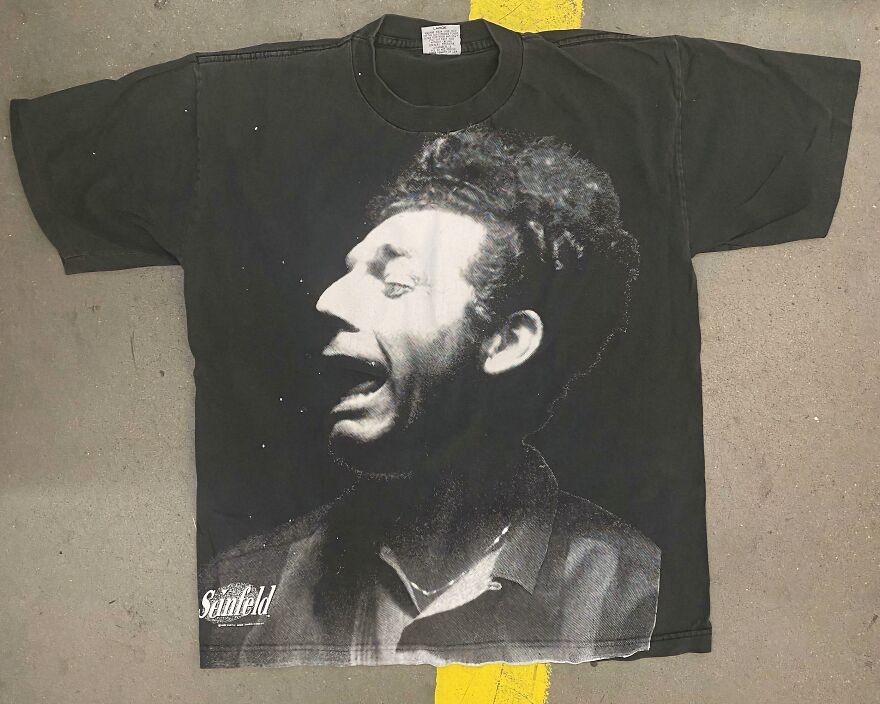 Vintage black Seinfeld t-shirt with a B&W image of Kramer laughing, found in the Goodwill bins.