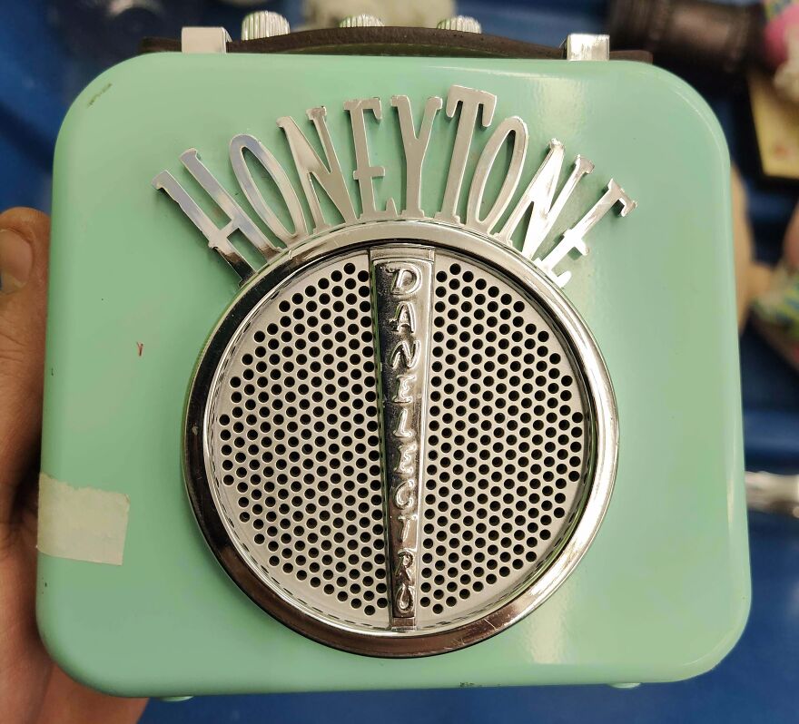 A mint green Danelectro Honeytone mini amplifier, a good find from the Goodwill Bins.