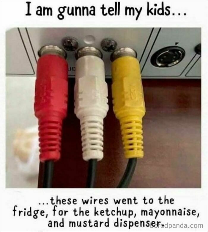 Red, white, and yellow AV cables plugged in, humorously described as ketchup, mayonnaise, and mustard in ’90s memes nostalgia.