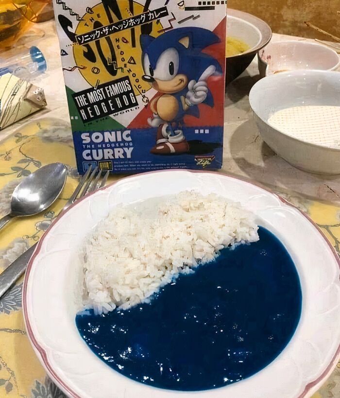 Sonic the Hedgehog Curry, a bright blue Food Crime, served with rice on a plate. Bananasausage.