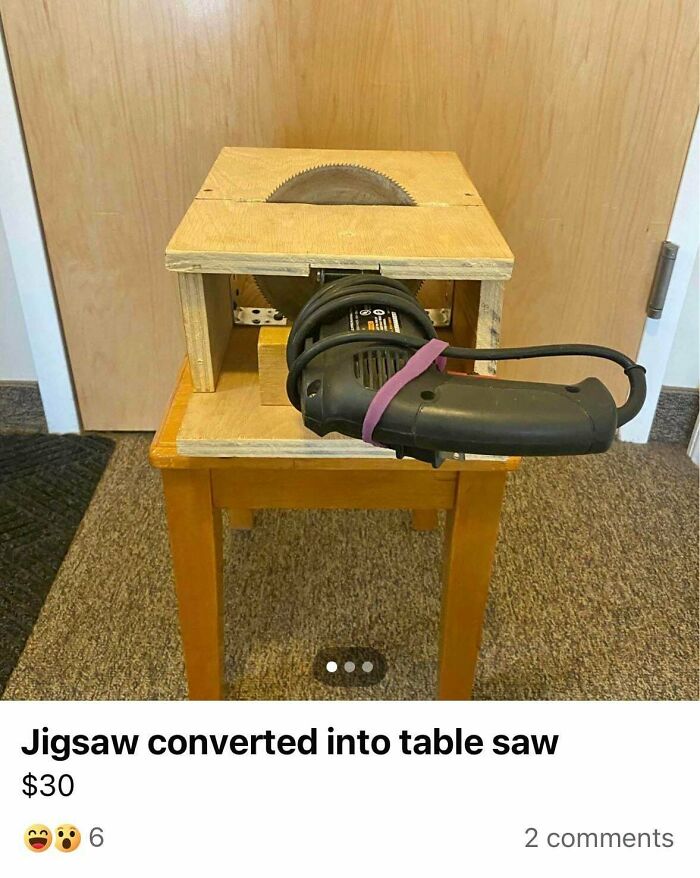 A DIY DiWHY jigsaw converted into a table saw, mounted on a wooden stand. A dangerous home improvement fail.