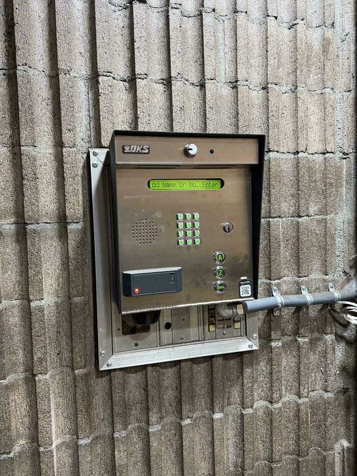 A DKS intercom system on a textured wall, displaying "Ent Name Or No. Enter." A DiWHY attempt that failed.