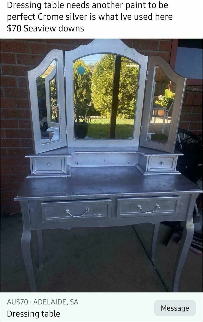 A silver-painted dressing table with a three-panel mirror, a good example of DiWHY furniture.