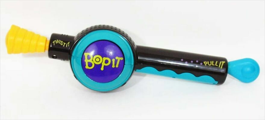 A colorful Bop It game device, a nostalgic toy from childhood, makes people take a trip down memory lane.