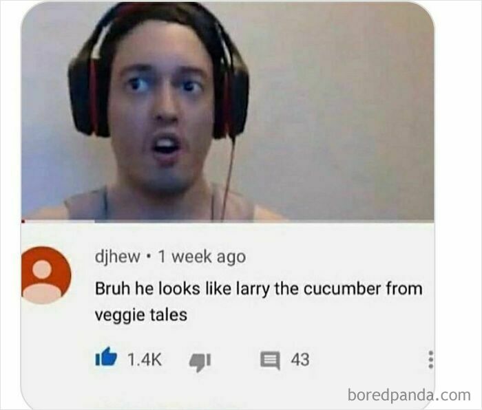 A man wearing headphones looks shocked by a YouTube comment comparing him to Larry the Cucumber, one of those rare burns.