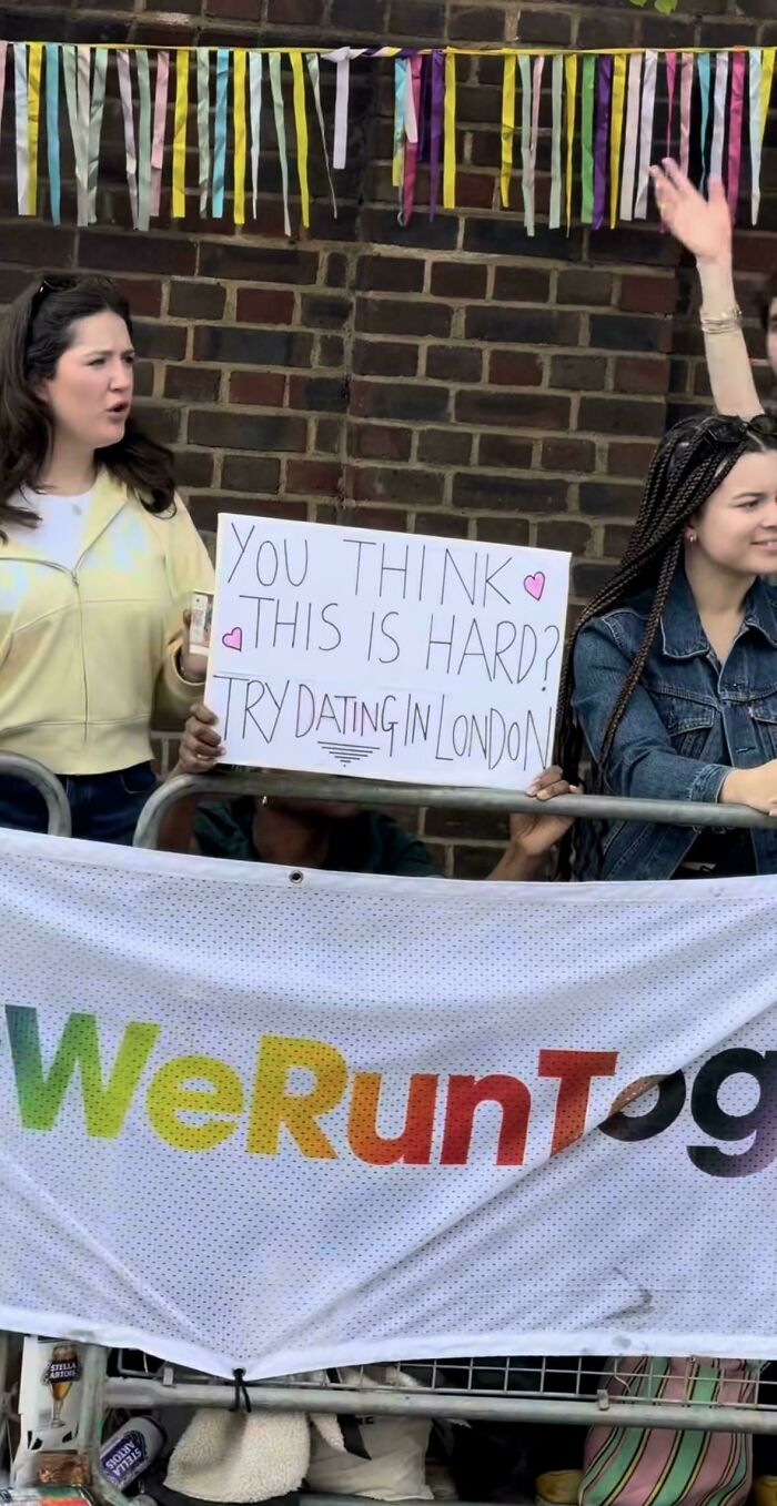 British protest sign about the difficulty of dating in London