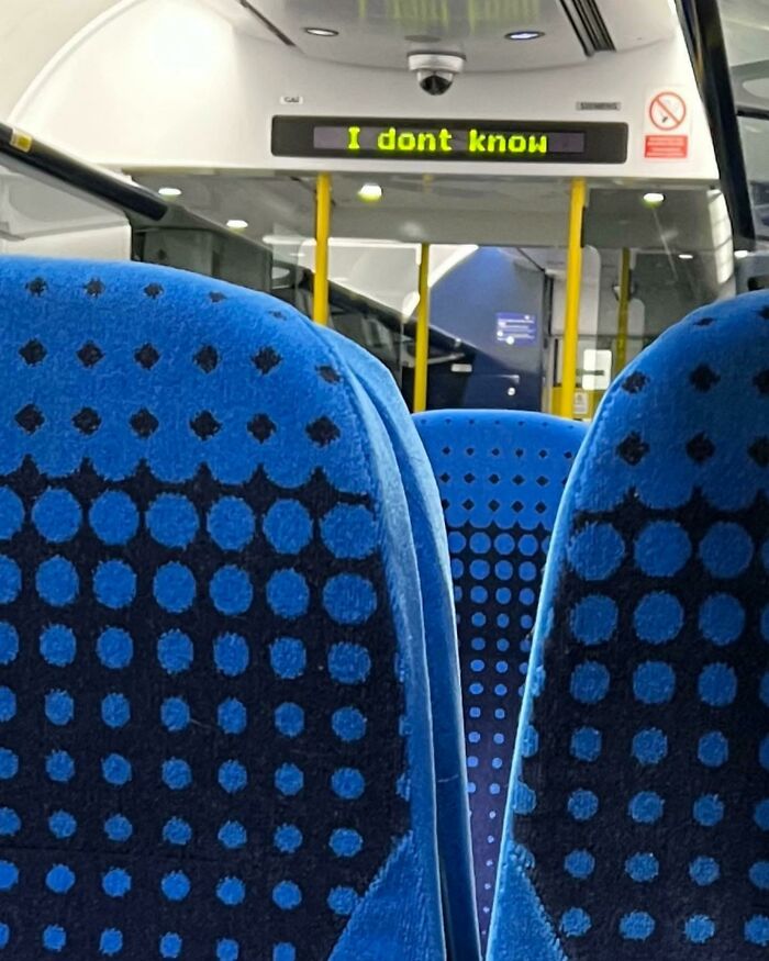 Funny bus interior sign displaying I dont know message on screen
