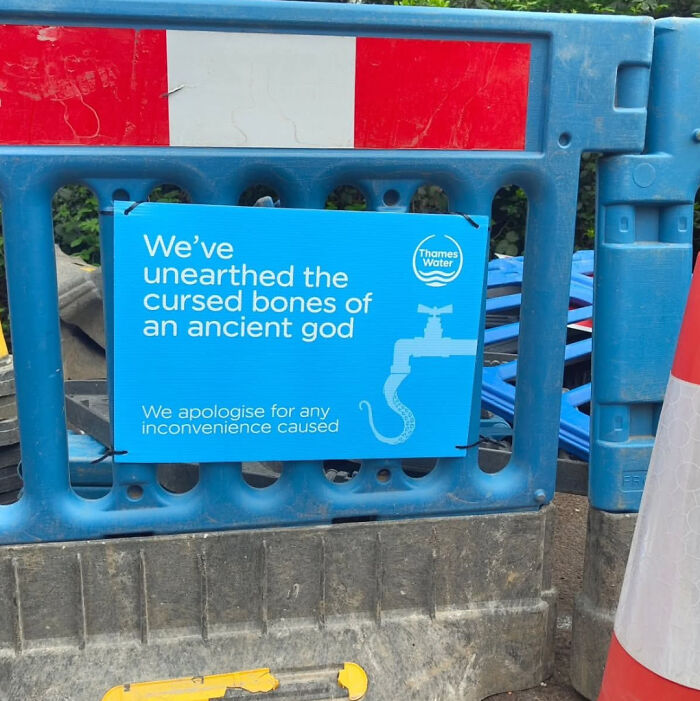 Playful Thames Water sign about unearthing cursed bones of an ancient god