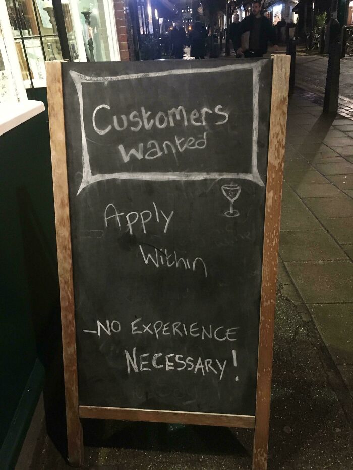 Chalkboard sign humorously asking for customers with no experience needed