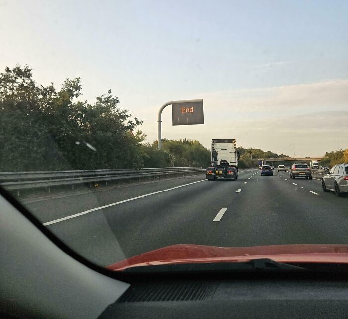 Road sign on British highway showing the word End