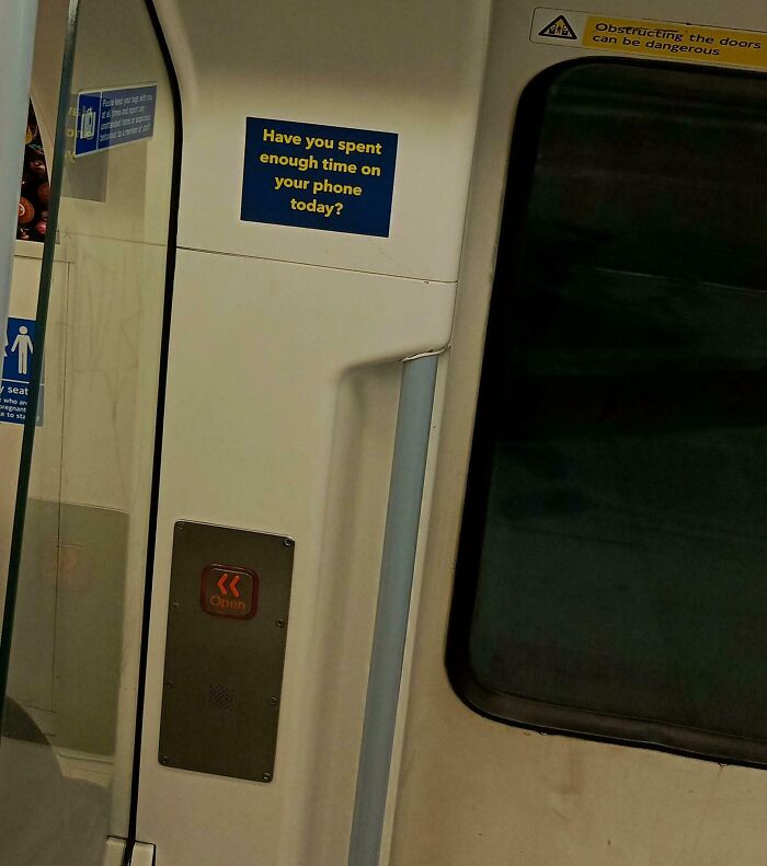 Funny British sign asking if you've spent enough time on your phone today