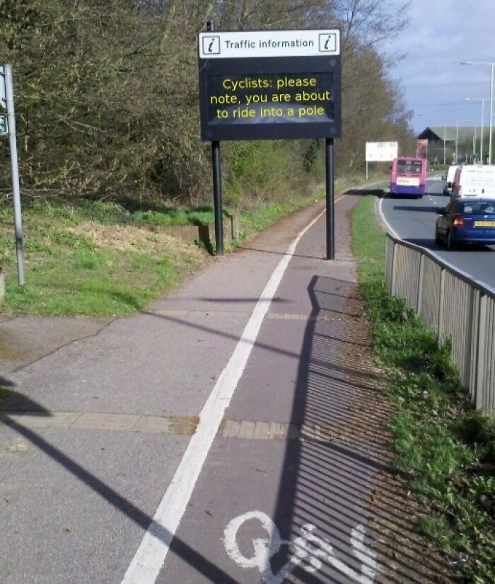 British humorous traffic sign warning cyclists about riding into a pole