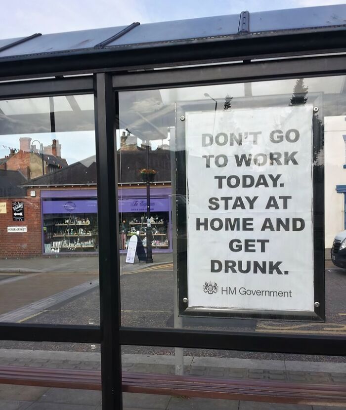 Joking government sign advising stay home and get drunk instead of going to work