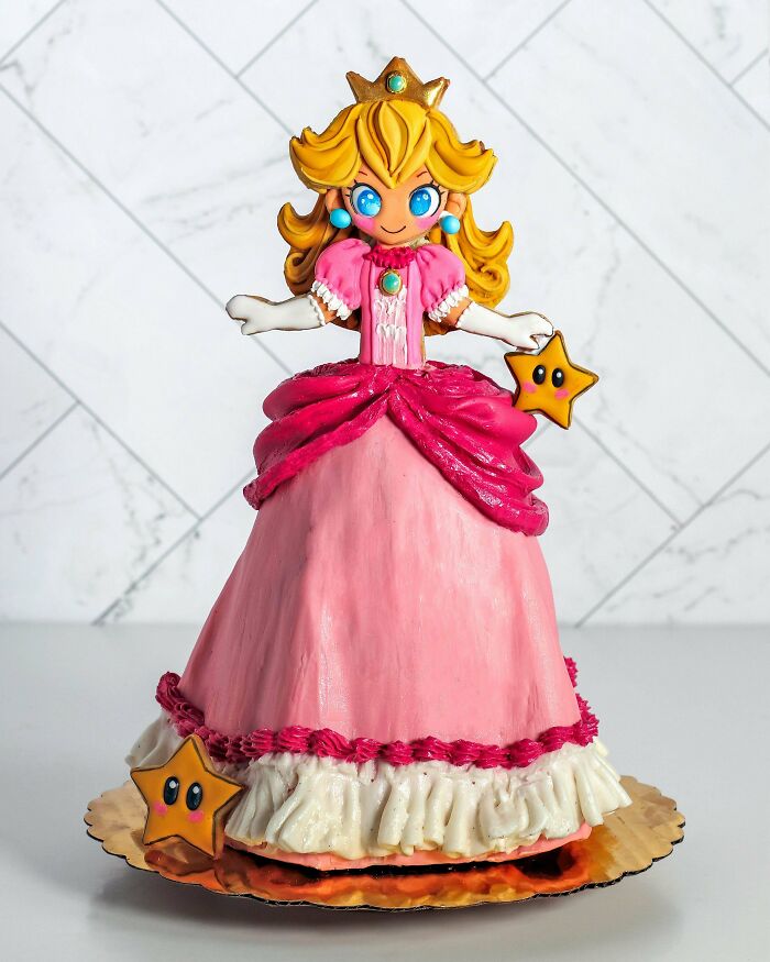Princess-themed dessert cake with pink frosting and star decorations