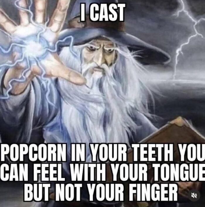 A meme of a wizard casting a spell, with the text I CAST POPCORN IN YOUR TEETH. This unhinged meme might make your inner goblin laugh.