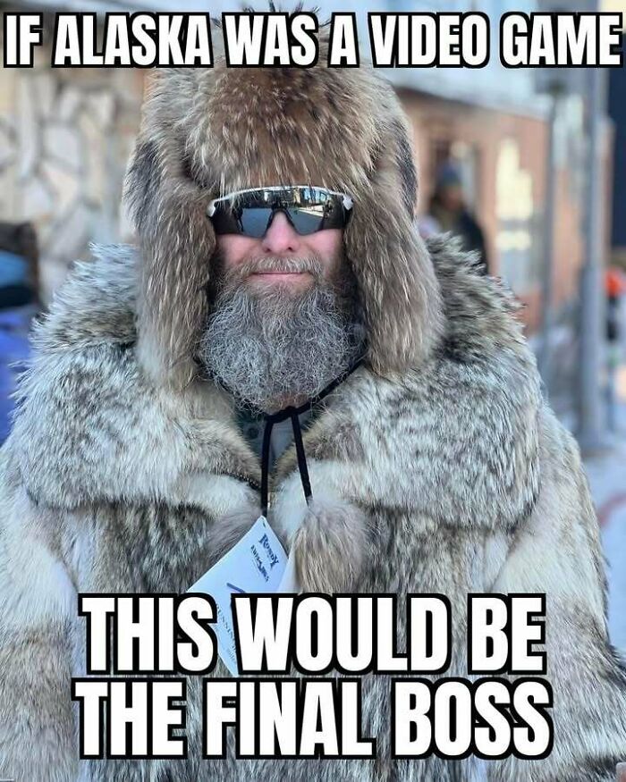 A man in a large fur coat and hat, with a gray beard and sunglasses, representing living in Alaska. Hilarious memes.