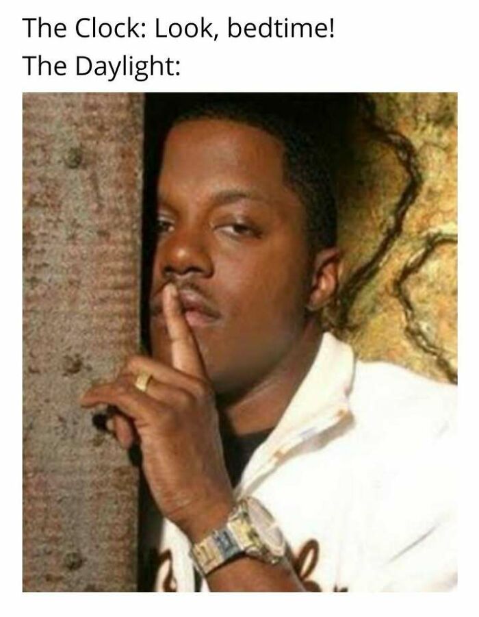 Hilarious memes sum up living in Alaska. A man shushes, representing daylight disrupting bedtime.