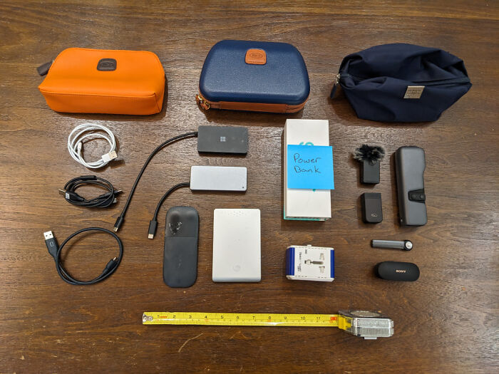 Tech accessories and gadgets organized on a table for Easter basket ideas by age and toy stuffers selection.