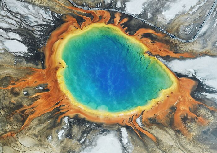 Aerial view of Grand Prismatic Spring, Yellowstone. Unbelievable photos taken on Earth, vibrant blue and orange thermal pool.