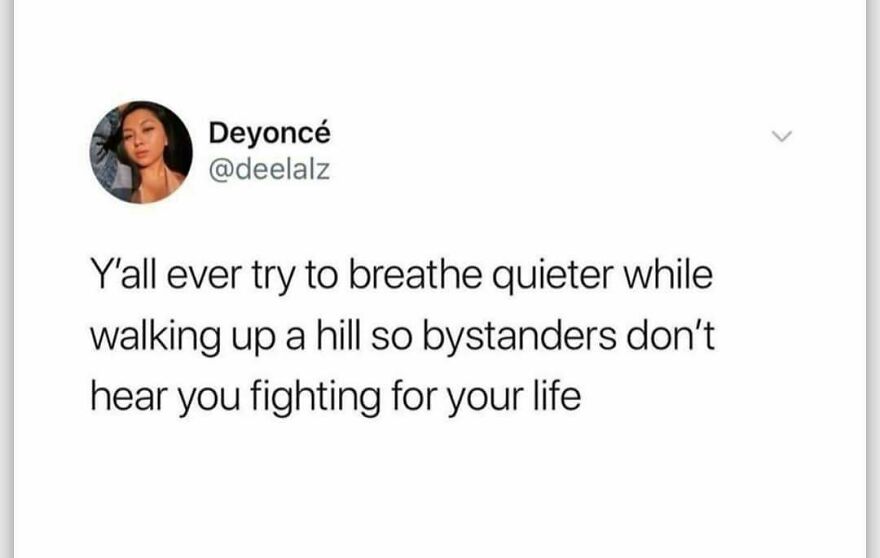 Camping and hiking meme showing a funny tweet about struggling to breathe while walking up a hill outdoors.